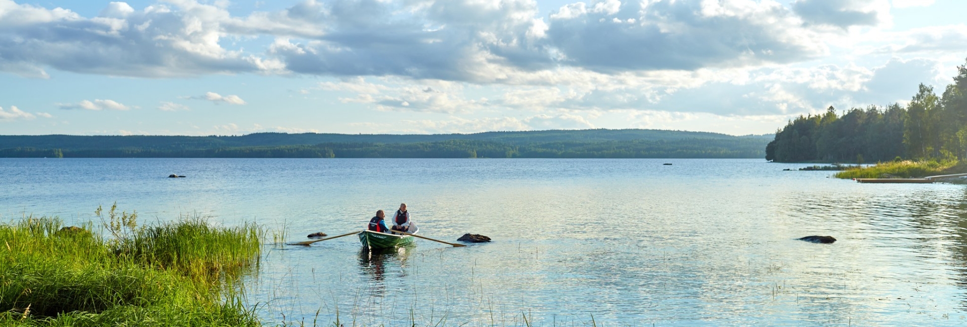 Row a boat on lake Pielinen